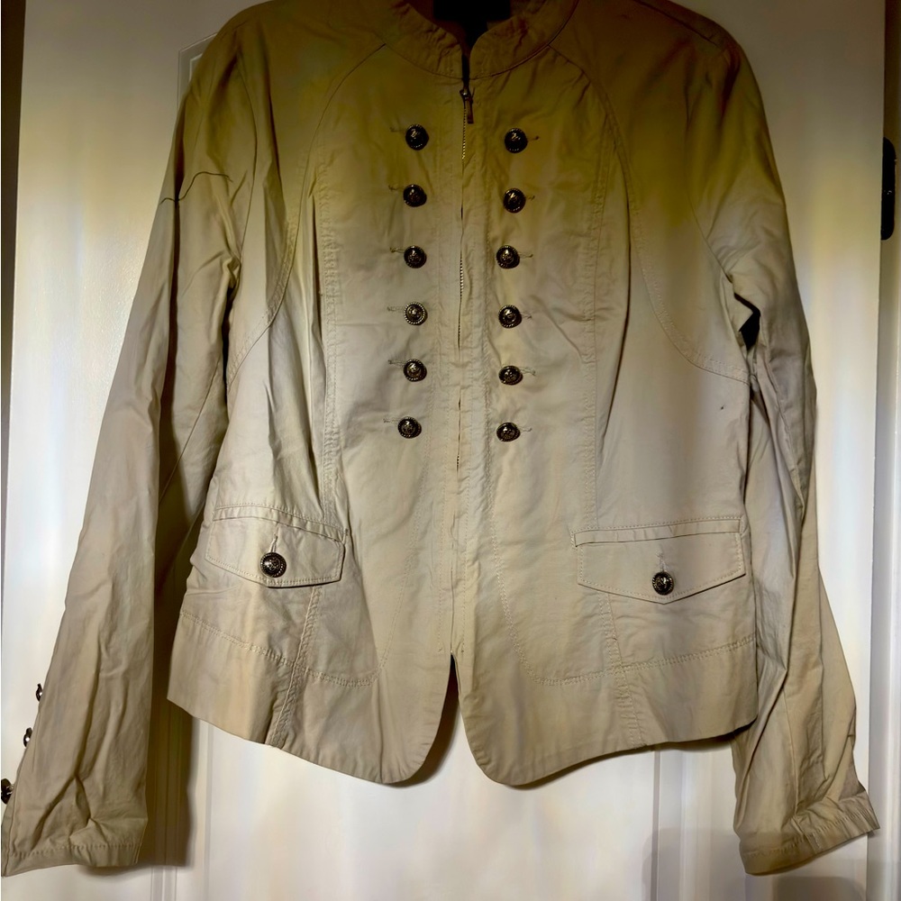 Double-Breasted light Beige Jacket with buttons as embellishment.